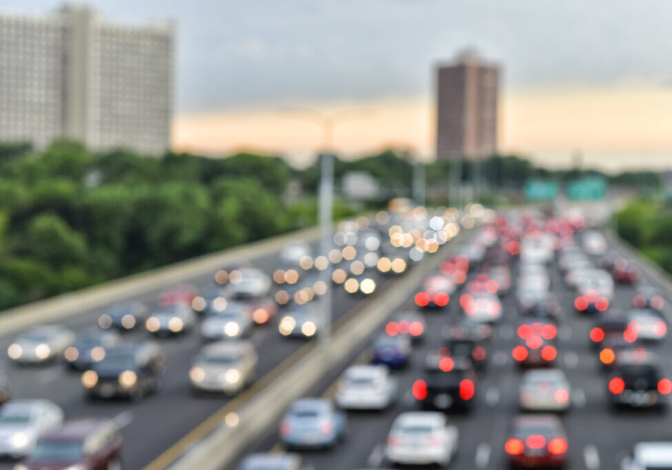 Rush Hour Traffic on Bridge Bokeh. Image is out of focus with Bokeh Orbs.
